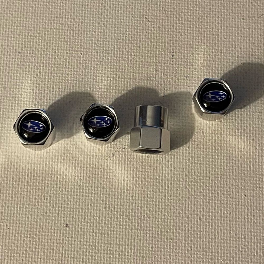 Subaru logo valve Stem caps in Silver set of 4 NWT